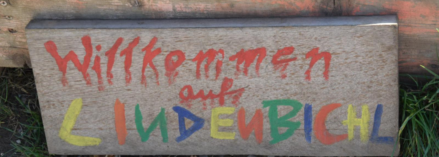 Schild: Willkommen auf Lindenbichl